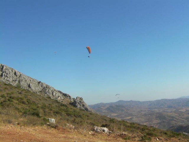por el aire